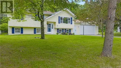 Lovely home on an incredible piece of property on just under half an acre, beautifully treed backyar...