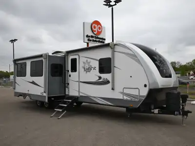 The 2020 Open Range 312BH is a spacious travel trailer built with families in mind, offering a comfo...