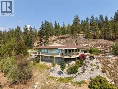 Welcome to 3954 Valleyview Road, a private estate property offering spectacular views of Skaha Lake,...