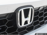 Introducing the 2026 Honda Civic Hybrid in a stunning white finish, this new sedan promises sophisti... (image 8)