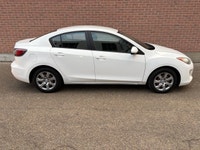 WHITE ON GREY CLOTH, DRIVES GREAT, NON SMOKER, 5 SPEED MANUAL.NEW SHOCKS, NEWER ALL SEASON TIRES. CE... (image 3)