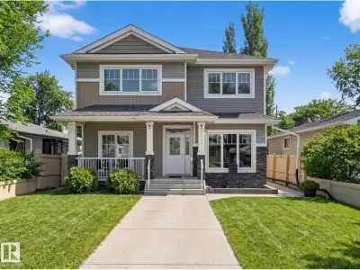 SHOWSTOPPER This custom centrally located home offers space, style, and income potential. Featuring...