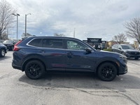 The 2024 Honda CR-V Hybrid EX-L in stunning Canyon River Blue Metallic offers an unparalleled blend... (image 3)