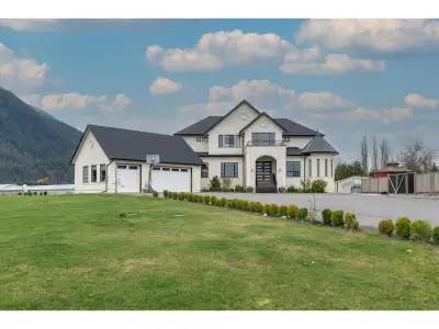 A custom-built 2-story home on a 5-acre blueberry farm with stunning mountain views. This property f...