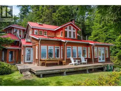 Waterfront home on Gossip Island. NE-facing property with 98 ft of sandstone shoreline & panoramic S...