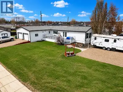 Check out this spacious 1,620 SQFT modular home with an addition situated on a corner lot in town. T...