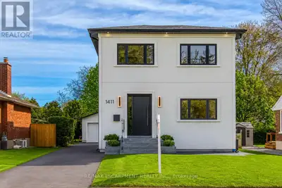 Welcome to 1411 Mountain Grove Ave, a custom-built contemporary masterpiece in Burlington's sought-a...
