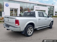Command your day with this robust 2017 Ram 1500 Laramie Crew Cab Pickup. Powering through tasks or c... (image 4)