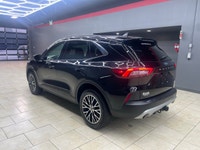 The 2024 Ford Escape in the elegant Black finish coupled with a Front-Wheel Drive system offers an e... (image 5)