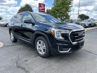 Command the road in this sleek 2018 GMC Terrain SLE, boasting a powerful 1.5L Turbo engine and a wea... (image 2)