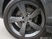 Experience elevated driving in the captivating 2024 Genesis GV70 3.5T Sport, showcasing a sophistica... (image 8)