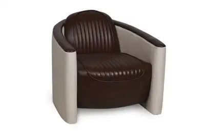 Mid Century Modern faux leather Aviator Armchair for $259, View more