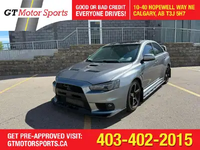 This 2014 Mitsubishi Lancer Evolution delivers pure performance with its turbocharged 2.0L engine, a...