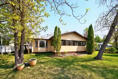 R26//Winnipeg Beach/Offers first come, first served. Discover comfort and charm at 239 Spruce Ave in...