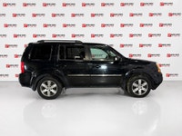 This 2014 Honda Pilot Touring gives you that dependable, comfortable feeling every time you drive it... (image 5)