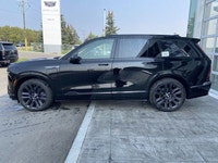 The 2026 Cadillac Vistiq 1SH, finished in elegant Stellar Black Metallic with a Jet Black interior,... (image 4)