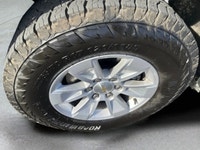 The 2023 Chevrolet Silverado 1500 Crew Cab Short Box 4-Wheel Drive Work Truck, in crisp white with a... (image 8)