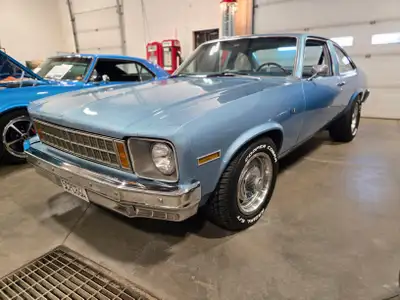 1977 Chevrolet Nova 2-dr Post Coupe. This little blue Nova has some incredible history with document...