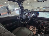This 2024 Jeep Wrangler Sport 2-Door Hardtop is powered by a 2.0L turbocharged 4-cylinder engine pai... (image 9)