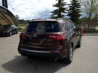 The 2011 Acura MDX Elite Package is a standout premium midsize luxury SUV that brings an aggressive,... (image 2)