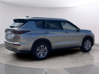 Introducing the 2026 Mitsubishi Outlander Plug-In Hybrid SE S-AWC, gliding in with a captivating sil... (image 5)