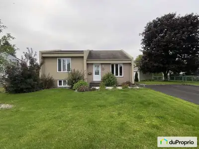 Magnifique bungalow de 4 chambres, clé en main - Secteur familial et paisible Le rez-de-chaussée com...
