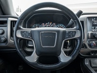 Turn heads and experience refined luxury with the 2018 GMC Sierra 1500 Denali, blending bold design,... (image 9)