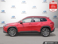 Odometer is 22659 kilometers below market average! Barcelona Red Metallic 2024 Toyota Corolla Cross... (image 1)