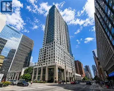 Welcome to luxury living at 15 Grenville Street! This bright and spacious south-facing 1-bedroom plu...