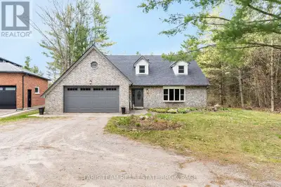 Top 5 Reasons You Will Love This Home: 1) Set on a rare three-quarter acre lot with a long winding d...