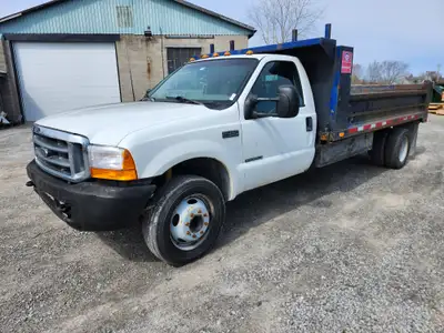 1999 Ford F450, 7.3L with 266033kms, automatic transmission. 14ft stationary utility box (not dump)...