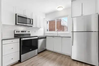 Fully renovated spacious 2 & 3 bedroom townhomes features kitchen with modern features and finishes...