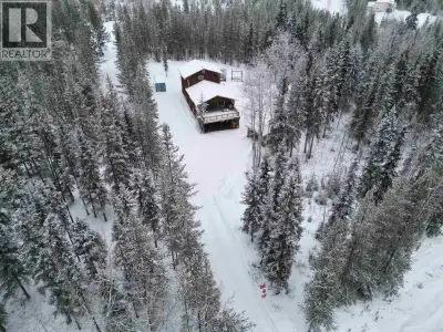Four-bedroom, three-bath home set on over five acres in a private, treed setting just minutes from t...