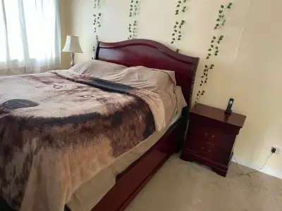Dark Cherry queen bed frame and 2 size table for sale, View more