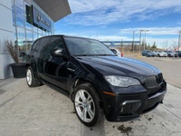 This 2011 BMW X5 M takes BMWs flagship SUV and infuses it with true M-division performance, deliveri... (image 3)