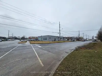 Excellent corner industrial property for sale at 13 Racine Rd, Etobicoke. Features include E1zoning...