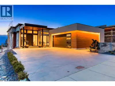 Experience exceptional luxury in this award-winning Noba Vision custom walk-out rancher, perfectly p...