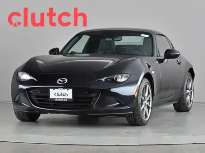 Auto Dimming Rearview Mirror, Front Heated Seats, Automatic High Beams and more! Clutch is the large...