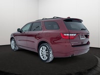Experience the ultimate fusion of muscle-car attitude and three-row utility in this aggressive SUV,... (image 3)