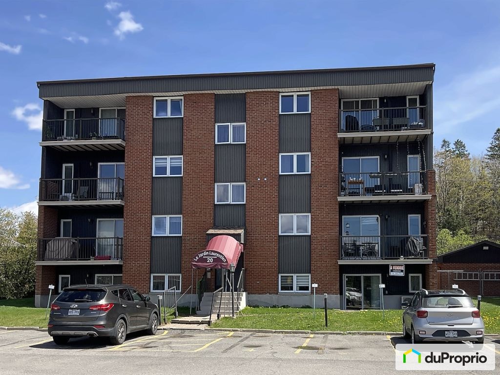 $230,000 - Condominium in Charlesbourg (ND-Des-Laurentides) — photo 1