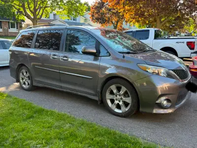 This reliable 2013 Toyota Sienna is a well-maintained used minivan perfect for family adventures and...