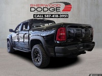 This Ram 1500 has a powerful Twin Turbo Premium Unleaded I-6 3.0 L/183 engine powering this Automati... (image 1)