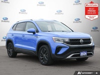 New Price! Odometer is 10494 kilometers below market average! Blue 2024 Volkswagen Taos Comfortline... (image 1)