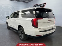 The 2025 GMC Yukon XL Elevation 4WD commands attention with extended-length presence, bold monochrom... (image 2)