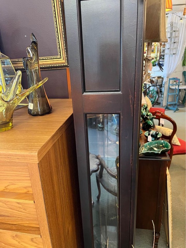 grandfather clock! Dark brown in colour and a gold face Arts & Collectibles Calgary