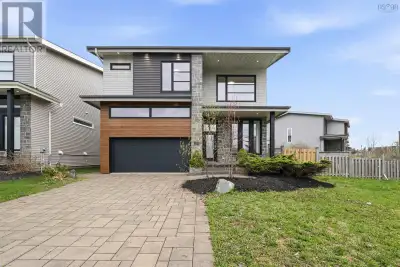Welcome to this modern-designed home located in one of the most desirable neighborhoods in West Bedf...