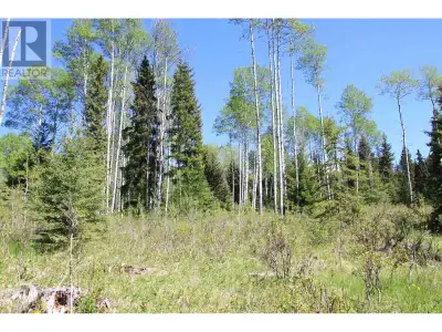 33 private and quiet acres. The land slopes up gently from the front to the back, where it backs ont...