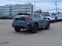 The pre-owned 2024 Subaru Crosstrek Onyx in Blue with a Grey interior delivers rugged versatility, m... (image 6)