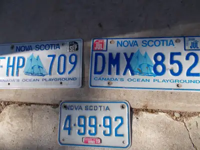 Two Bluenose Nova Scotia plates and one Nova Scotia motorcycle plate. All for $20.