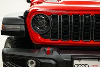 Why buy new? Save over $13,800 + tax from new on this ultra low KM 2026 Jeep Wrangler 4-Door 4x4 Rub... (image 2)